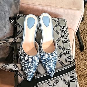 Blue rhinestones slide in shoes